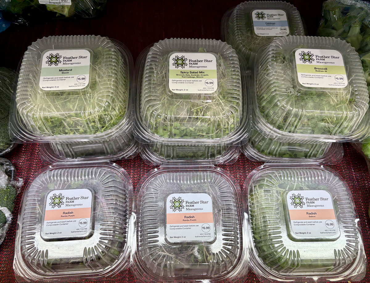 Feather Star Farm micro greens in containers at a grocery store