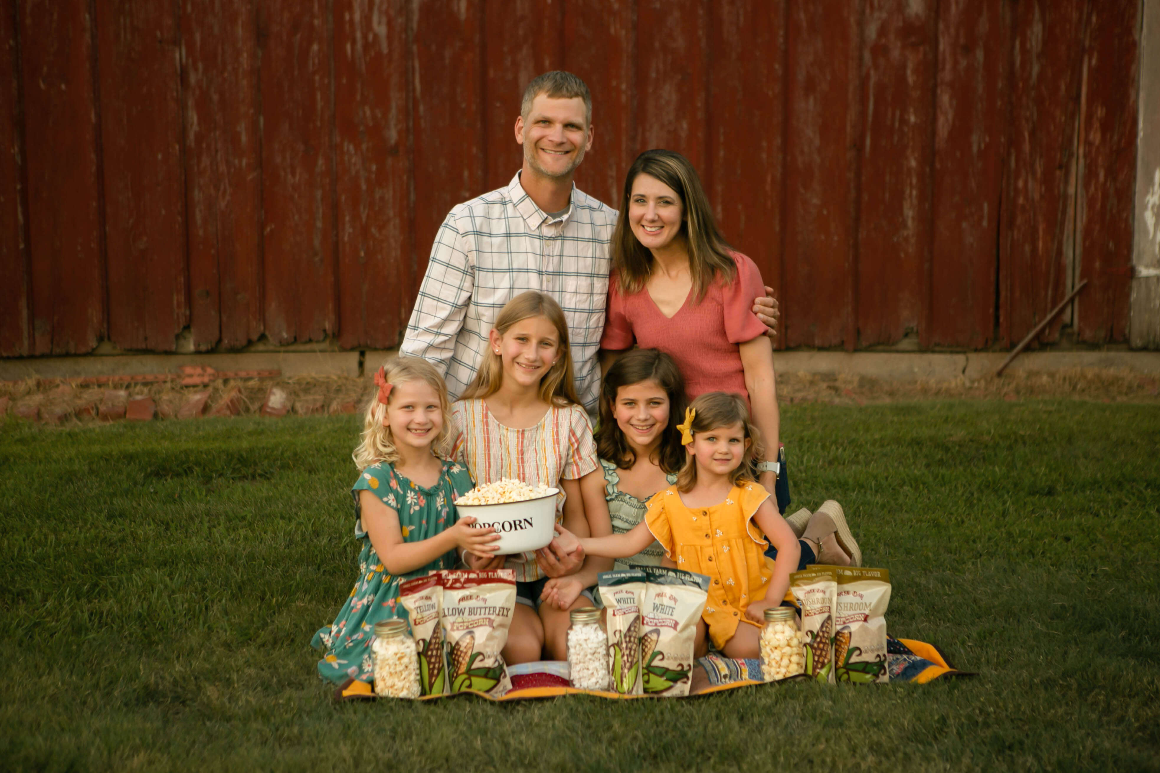 Free Day Popcorn owner family photo with popcorn products